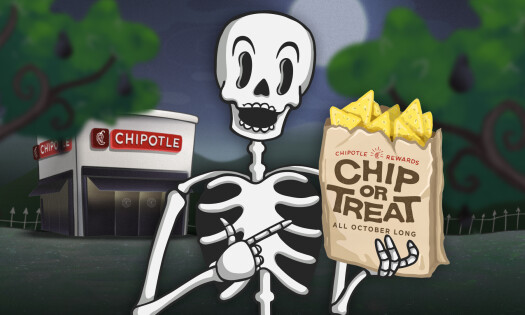 A skeleton holding up a Chipotle takeout paper bag