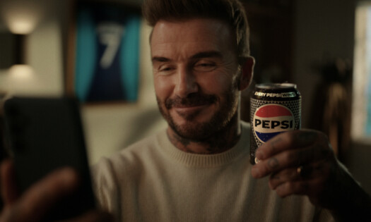 David Beckham holding a PEPSI can while video-calling Lauren James