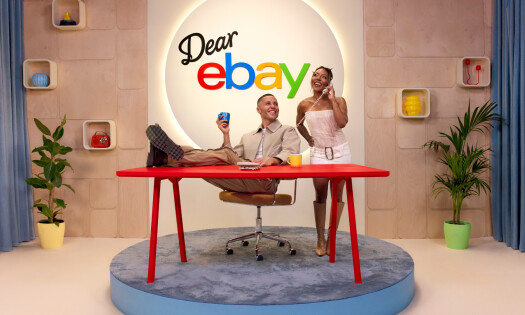 Jack Remmington and Ash Holme pose in front of the 'Dear eBay' show signage