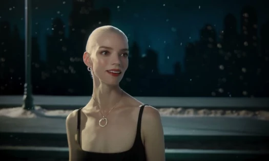 A shot of Anya Taylor Joy in a snowy city