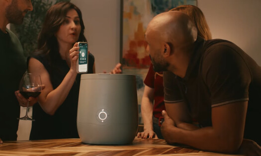 group of people around lomi 3