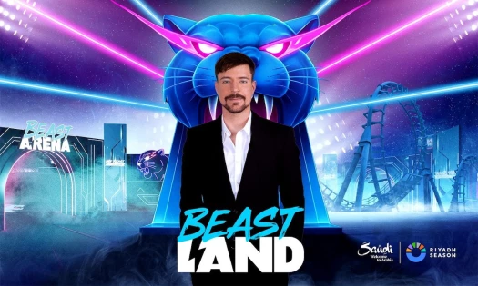 MrBeast standing in front of a neon backdrop, in a promotional image for his theme park, Beast Land