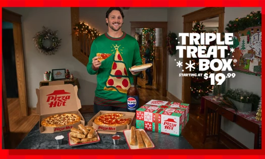 Josh Allen with boxes of Pizza Hut