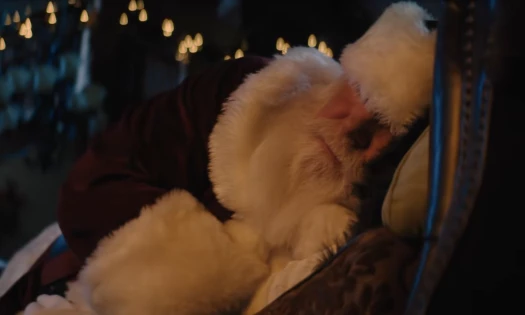 Santa, as seen in the Ford campaign spot, is having a nap on a chair