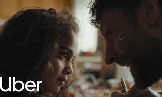 a daughter and father playing