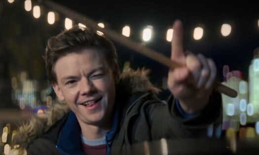 a man on a bench in London river bank