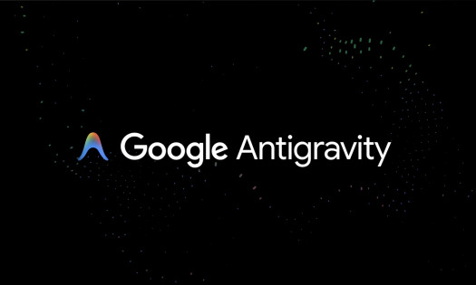 The official Google Antigravity logo overtop of a black backdrop with confetti-like graphics in the background