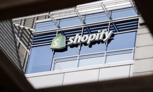 The Shopify logo on the front of a window