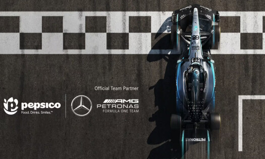 The pepsico and AMG Petronas F1 team logos beside a racecar