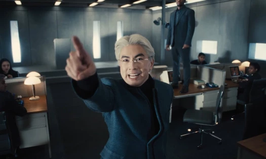 Bowen Yang pointing at the camera in anger