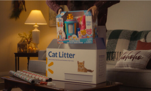 A toy inside of a cat litter box