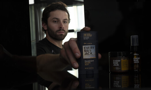 NFL star Baker Mayfield pictured with Every Man Jack's latest product line