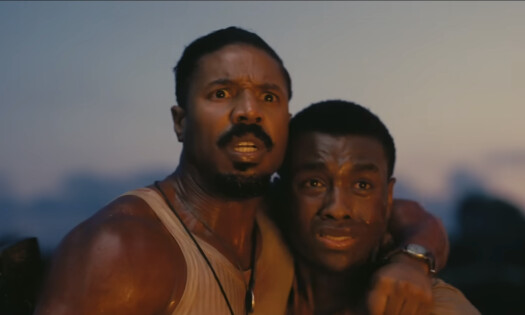 A scene from the movie "Sinners", showing Michael B. Jordan as characters Smoke and Stack