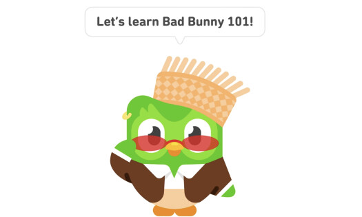 A screenshot of Duolingo's "Bad Bunny 101" campaign, showing the Duolingo Owl mascot dressed as Bad Bunny