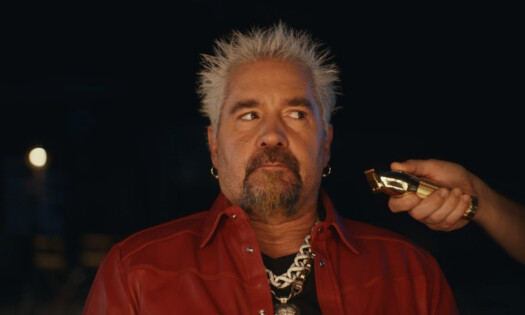 guy fieri with a hair trimmer
