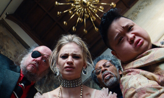 Four characters from Grubhub's Super Bowl teaser, dressed in lavish and artistocratic clothing