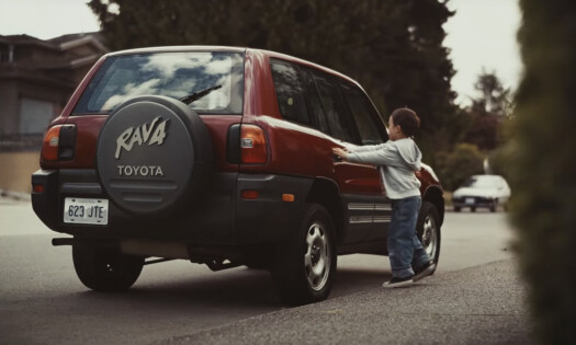 A young man smiles at his dad