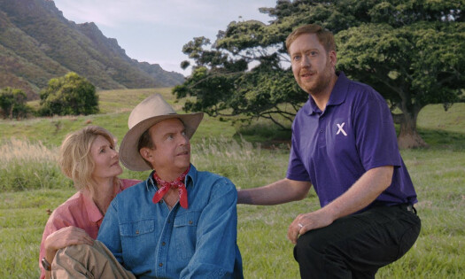 An Xfinity employee with the Jurassic Park cast