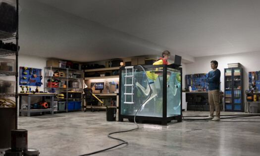 A person inside a water tank