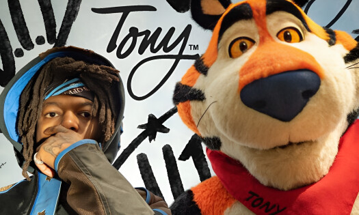 JID and Tony the Tiger posing together with graffiti in the background