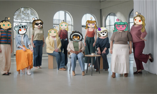 Women with Reddit characters covering their faces