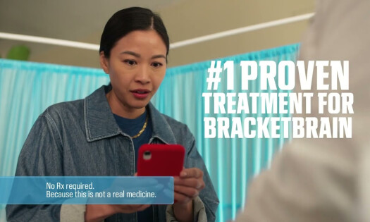 A doctor looking at her phone