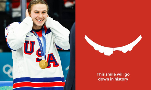 Jack Hughes smiling wearing a gold medal and the colgate ad with the text: "This smile will go down in history"