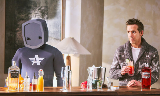 Ryan Reynolds holding a cocktail