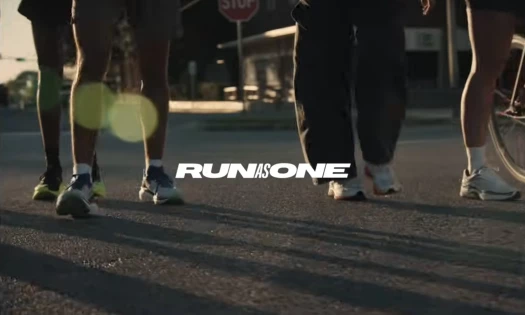 A runner running in Saucony shoes