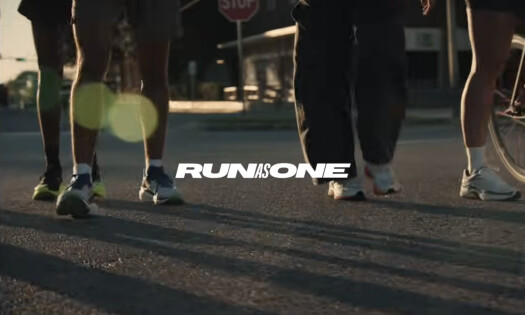 A runner running in Saucony shoes