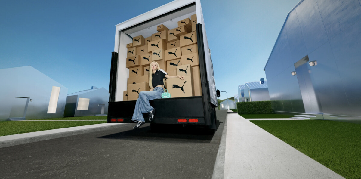 Rosé sitting on a truck full of PUMA boxes