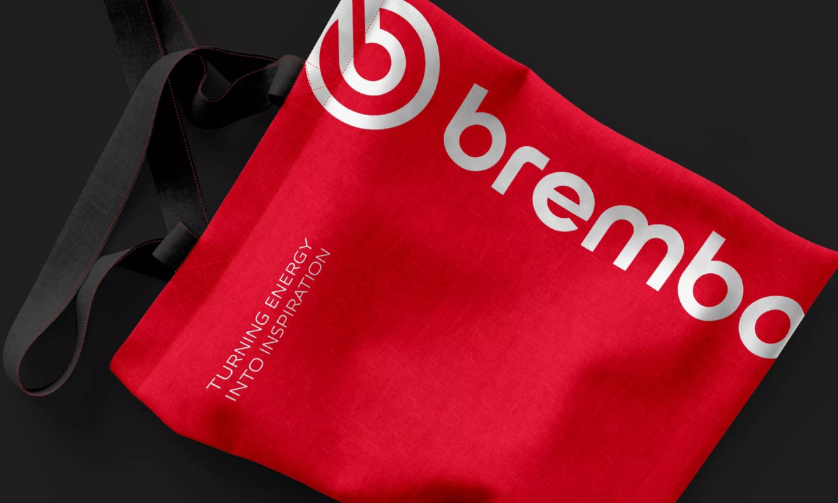 Branded tote highlights identity across physical touchpoints