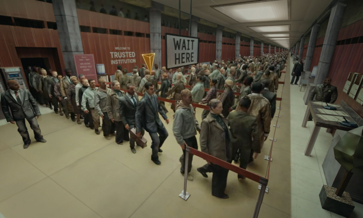 An overhead view shows a massive line of people in suits moving through a rigid, looped environment