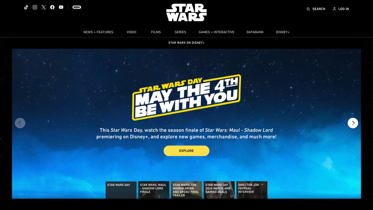 The main StarWars.com homepage on May 4, 2026, showing the Star Wars Day carousel hero, EXPLORE CTA and five-card hub strip along the bottom.