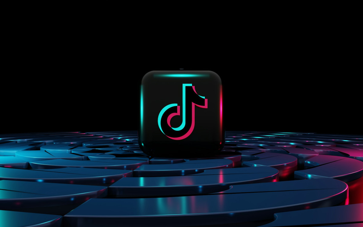 a-square-icon-tiktok-logo-sitting-on-top-of-a-3d-surface