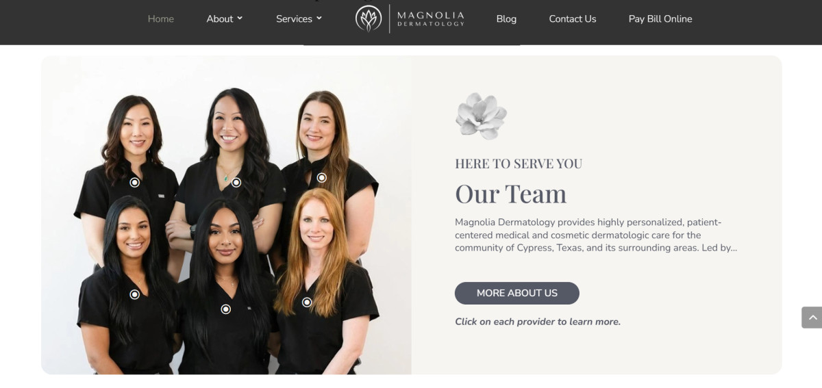 Webpage displays an interactive staff group photograph.