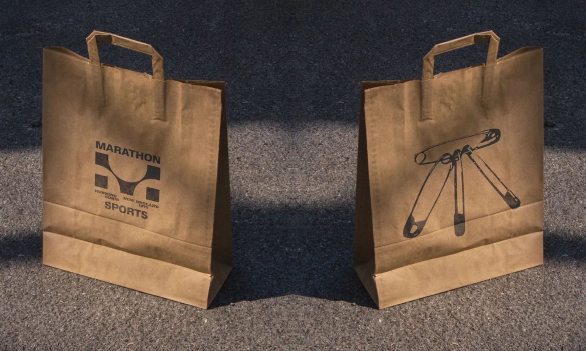 Shopping bags feature the brand logo and pin graphics.