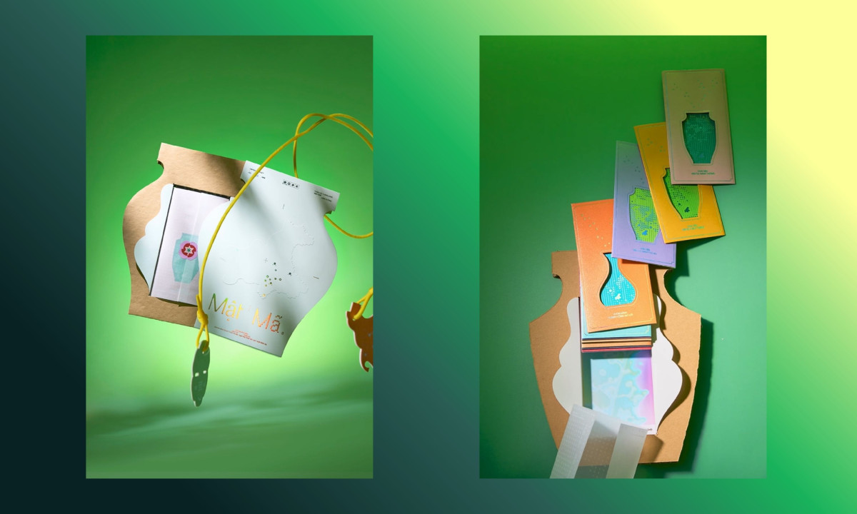 Cardboard vase structure holds colorful layered gift cards.