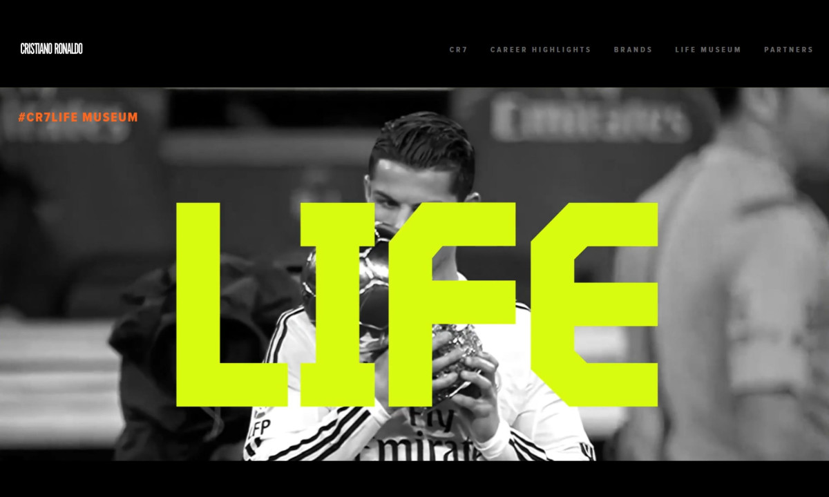 Webpage features bold neon text over a monochrome photograph.