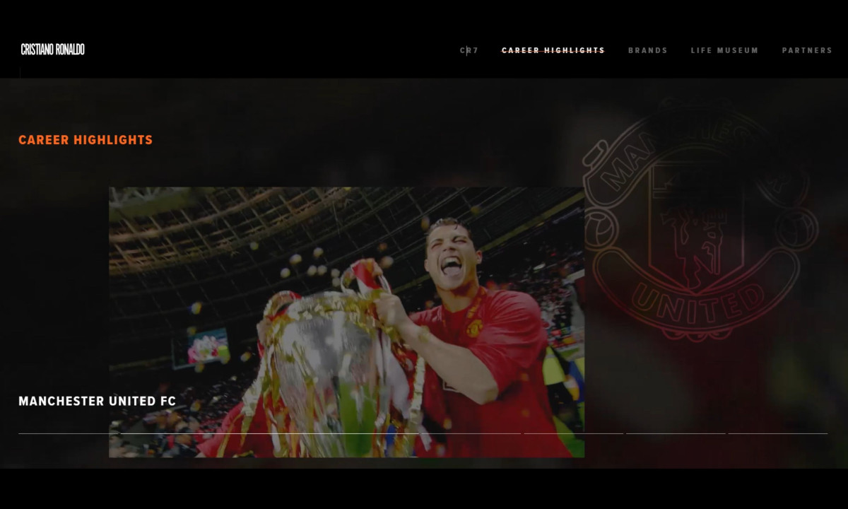 Dark web layout displays Ronaldo celebrating with a trophy.