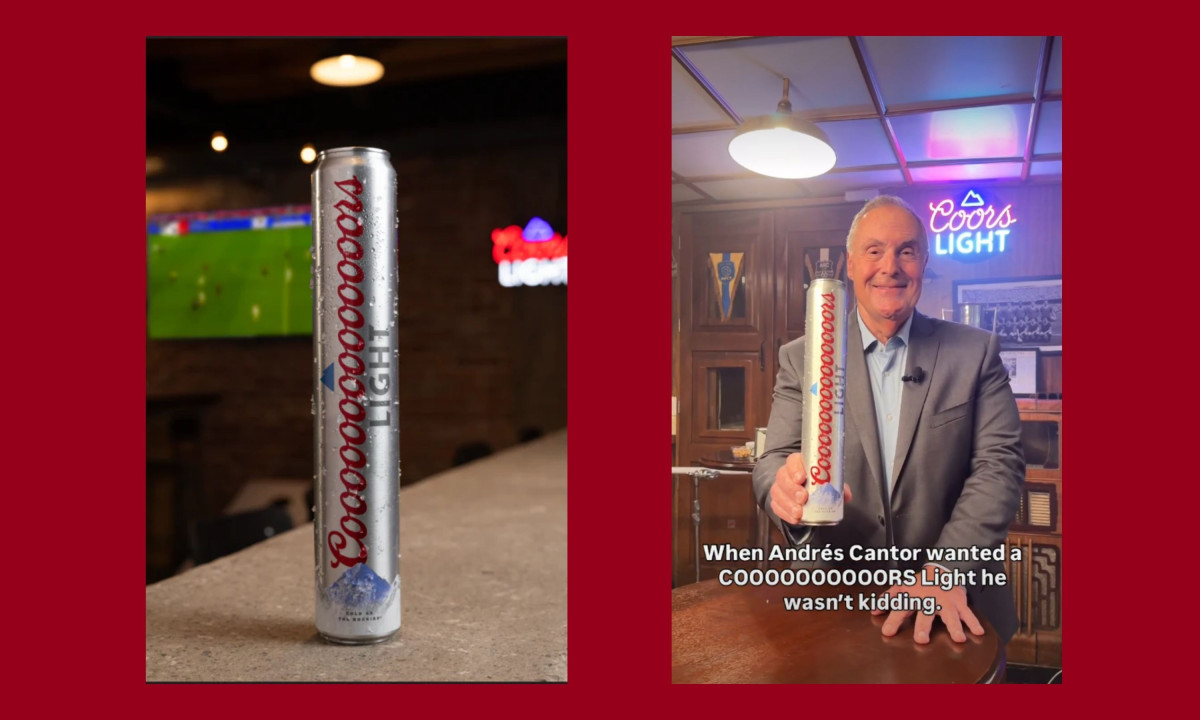 Sportscaster Andrés Cantor holds a tall silver beer canister.