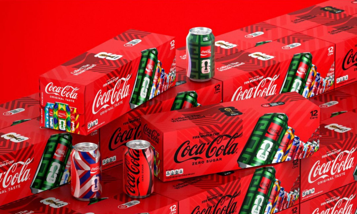 Red Coca-Cola boxes display various colorful limited-edition cans.