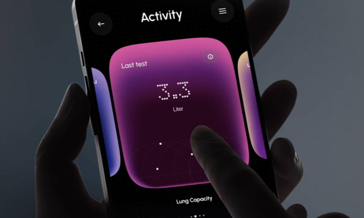 A hand holds a smartphone displaying the Airofit app's dark-mode Activity screen with a glowing pink card showing a 3.3 Liter lung capacity reading.