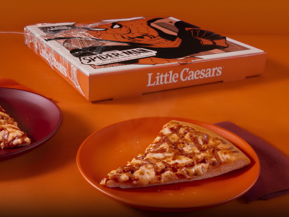 Spider-Man themed Little Caesars pizza box and pizza slice.