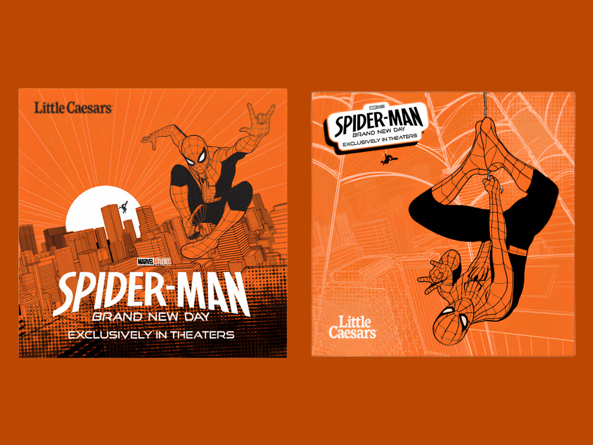 Two orange Little Caesars pizza boxes featuring Spider-Man.