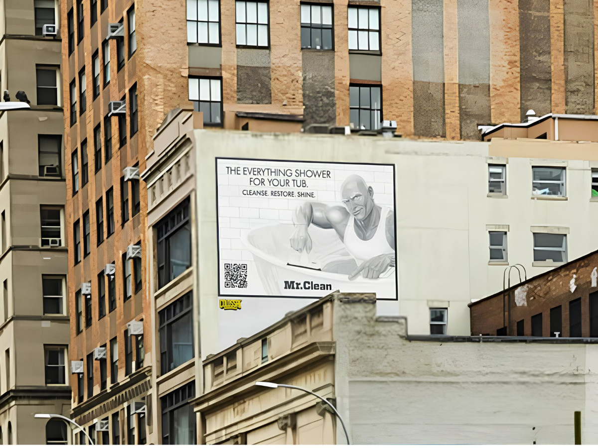 Mr. Clean "Everything Shower" billboard on city building.