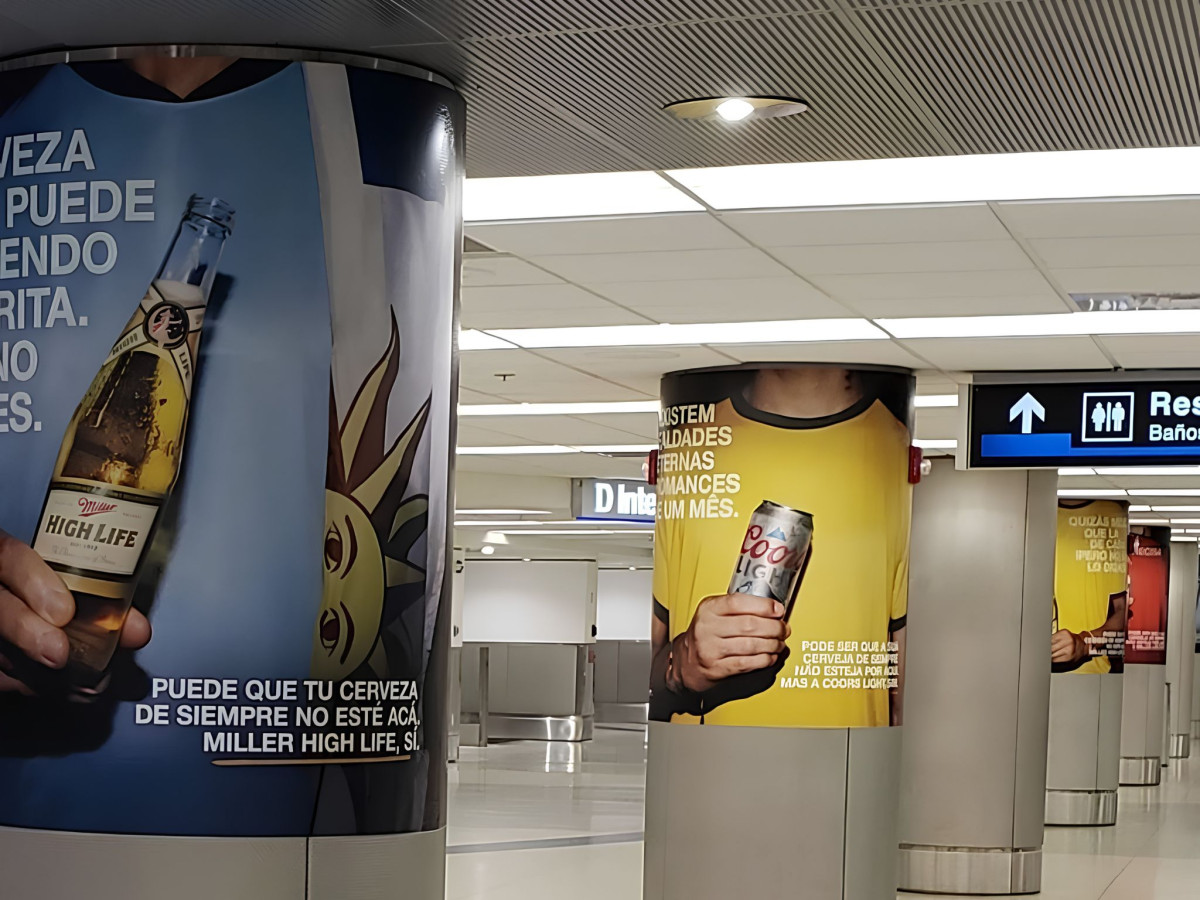 Beer ads on airport pillars targeting international fans