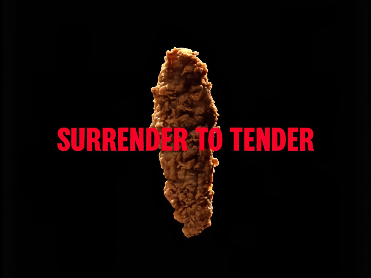 Chicken tender with "SURRENDER TO TENDER" text.