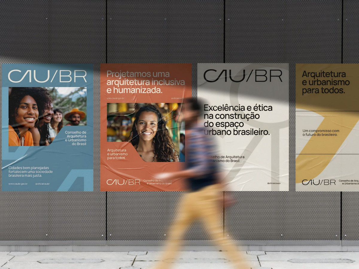 Four CAU/BR brand posters on a textured wall.