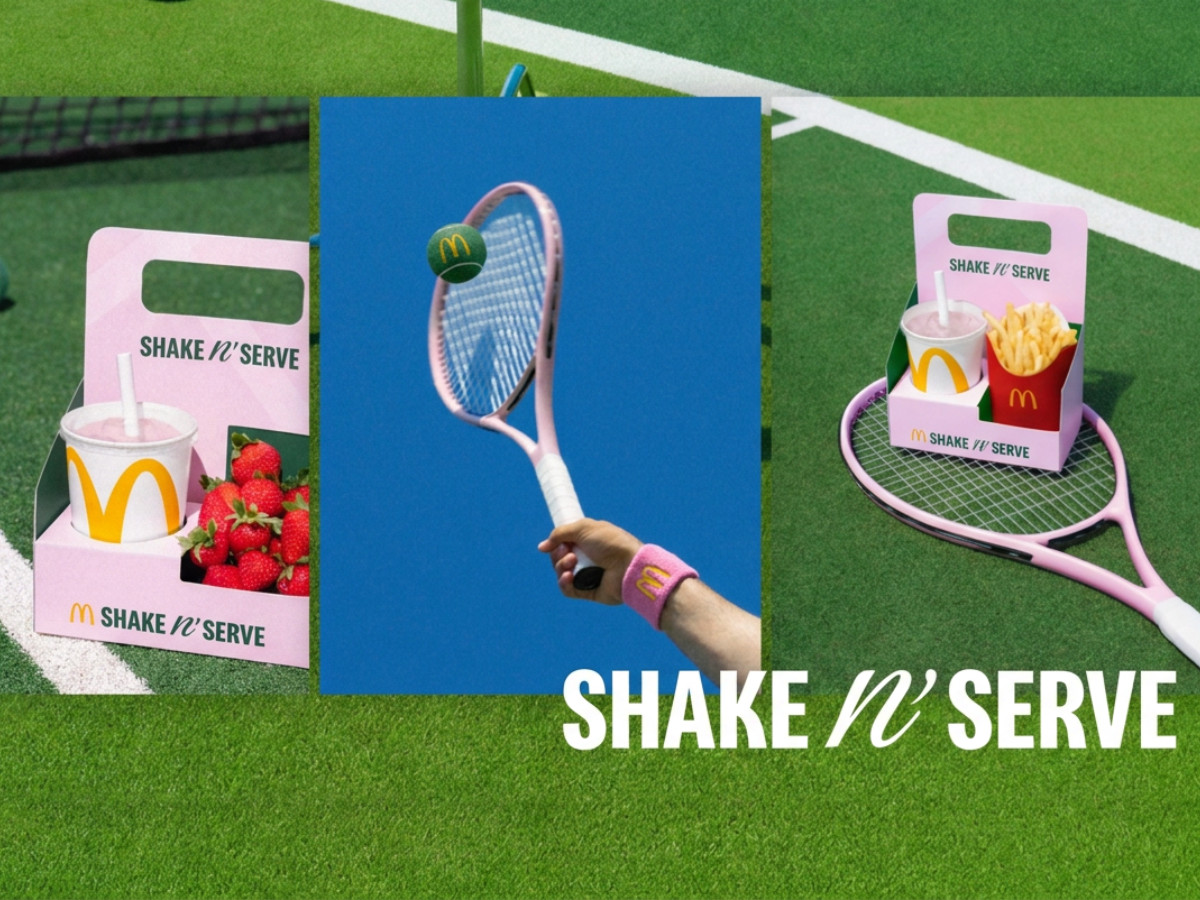 Shake n' Serve box on a bench next to a McDonald's tennis ball.